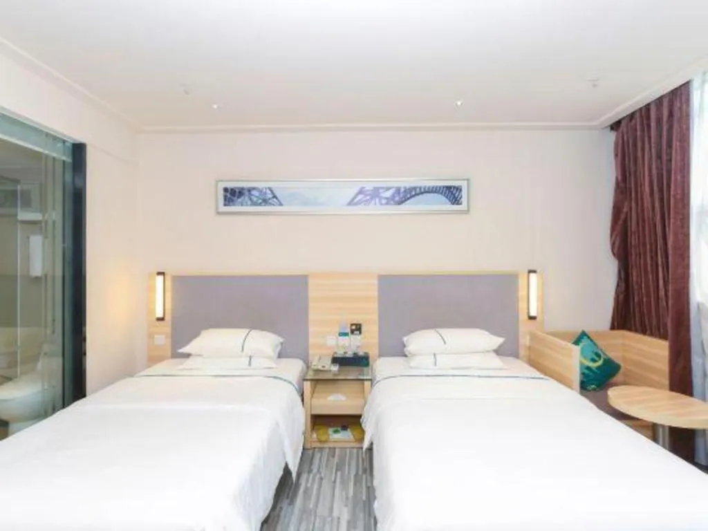 Bed in City Comfort Inn Zhuhai University Town Tangjiawan Plaza