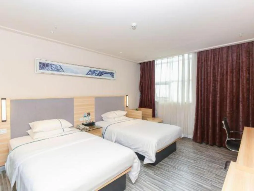 Bed in City Comfort Inn Zhuhai University Town Tangjiawan Plaza
