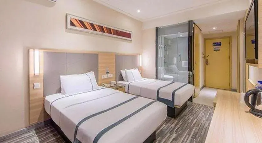 Bed in City Comfort Inn Wuzhou Bus Station Bed in City Comfort Inn Wuzhou Bus Station