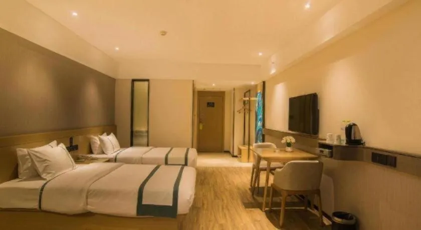 Bed in City Comfort Inn Liuzhou Wuxing Walking Street Zhonghuan Tower