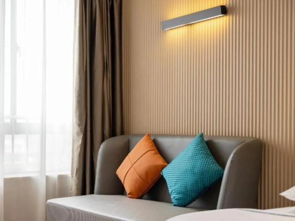 Bed in City Comfort Inn Liuzhou Wuxing Walking Street Zhonghuan Tower