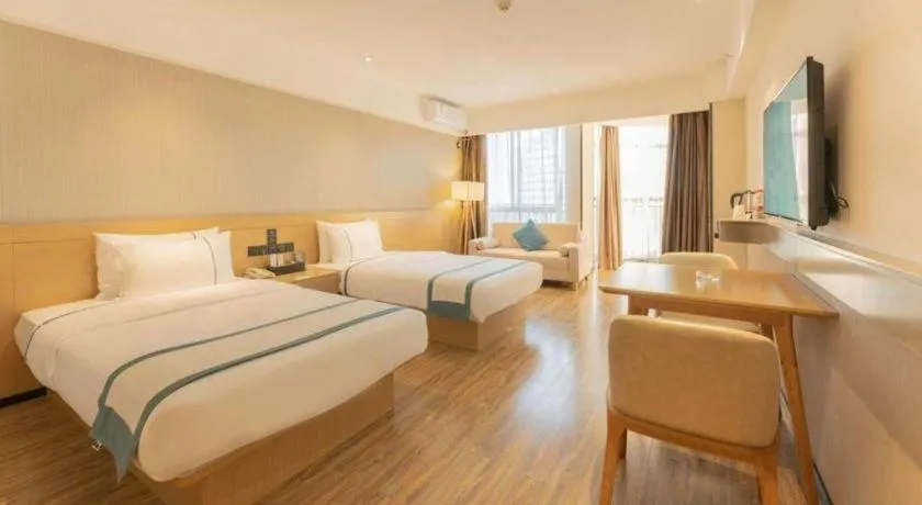 Bed in City Comfort Inn Liuzhou Wuxing Walking Street Zhonghuan Tower