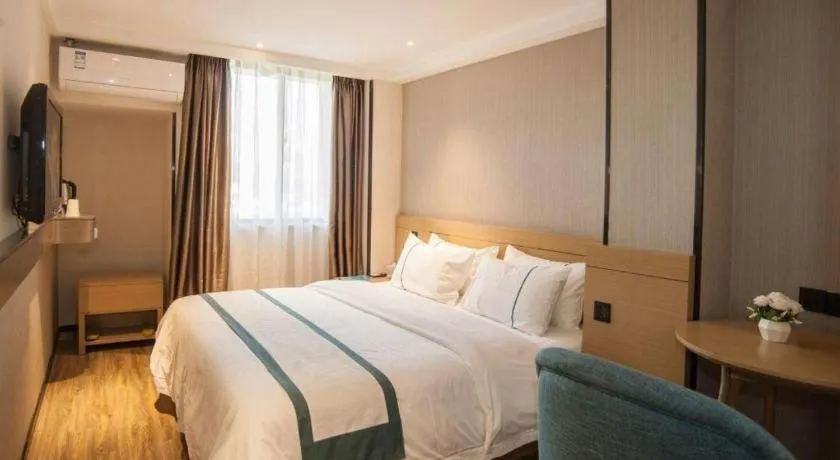 Bed in City Comfort Inn Liuzhou Wuxing Walking Street Zhonghuan Tower