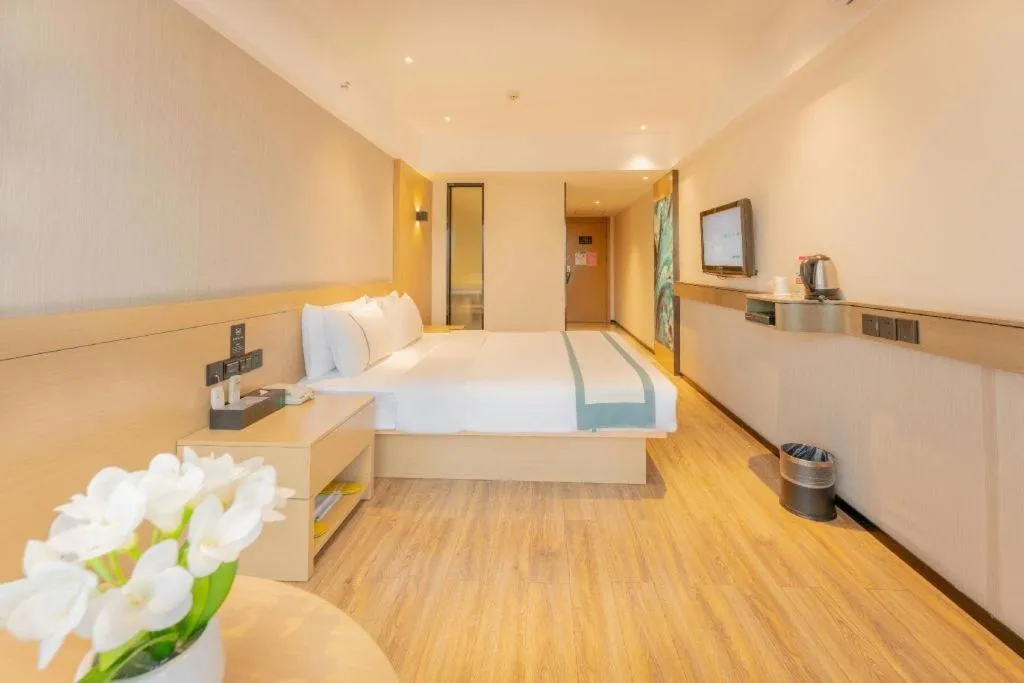 Bed in City Comfort Inn Liuzhou Wuxing Walking Street Zhonghuan Tower