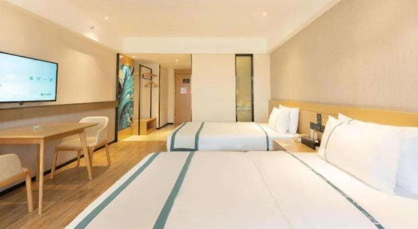 Bed in City Comfort Inn Liuzhou Wuxing Walking Street Zhonghuan Tower