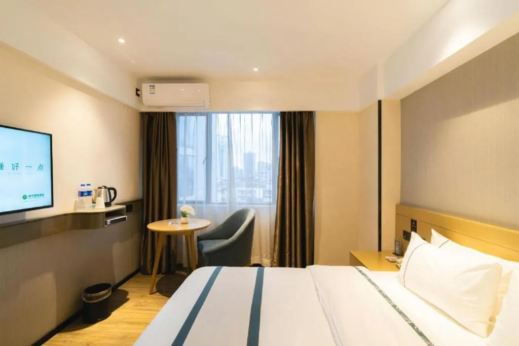 Bed in City Comfort Inn Liuzhou Wuxing Walking Street Zhonghuan Tower