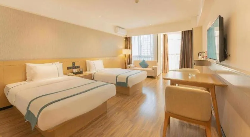 Bed in City Comfort Inn Liuzhou Wuxing Walking Street Zhonghuan Tower