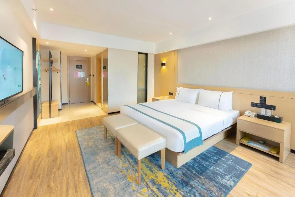 Bed in City Comfort Inn Liuzhou Wuxing Walking Street Zhonghuan Tower