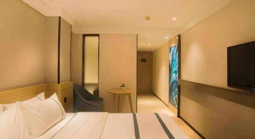 Bed in City Comfort Inn Liuzhou Wuxing Walking Street Zhonghuan Tower