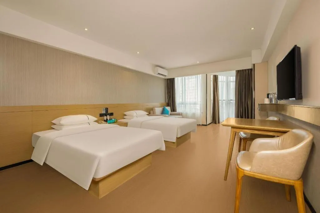 Bed in City Comfort Inn Liuzhou Wuxing Walking Street Zhonghuan Tower