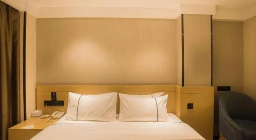 Bed in City Comfort Inn Liuzhou Wuxing Walking Street Zhonghuan Tower