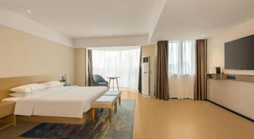 Bed in City Comfort Inn Liuzhou Wuxing Walking Street Zhonghuan Tower