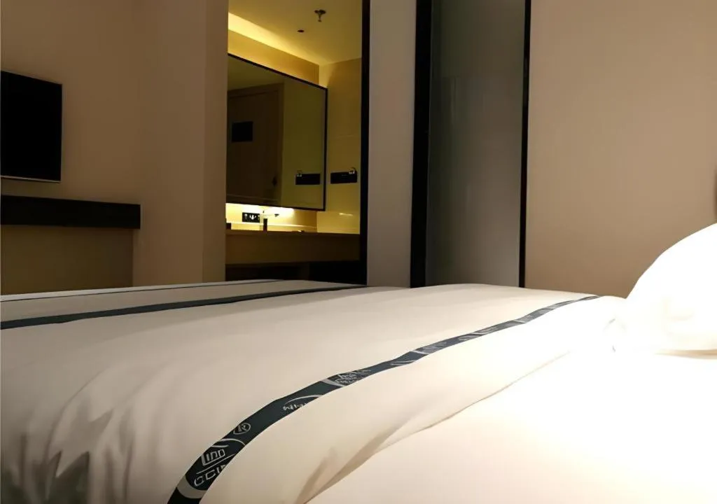 Bed in City Comfort Inn Hezhou Huangyao Ancient Town