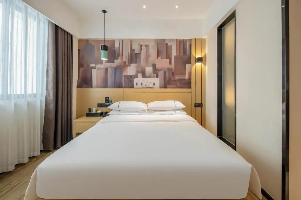 Bed in City Comfort Inn Hezhou Huangyao Ancient Town