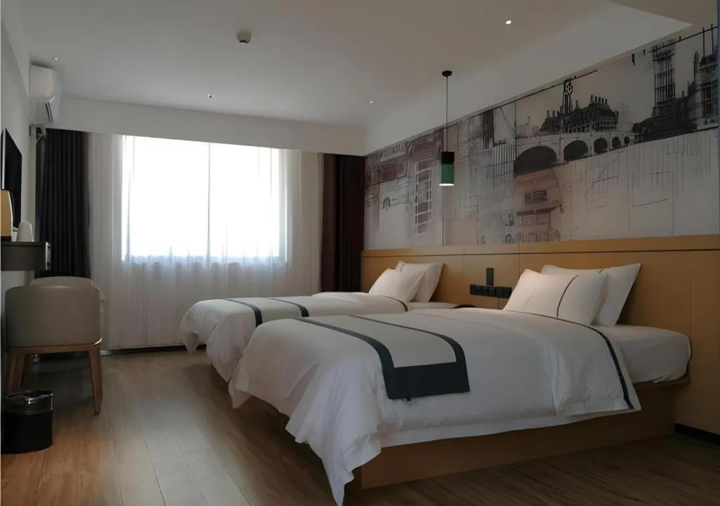 Bed in City Comfort Inn Hezhou Huangyao Ancient Town