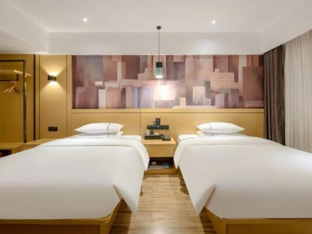 Bed in City Comfort Inn Hezhou Huangyao Ancient Town