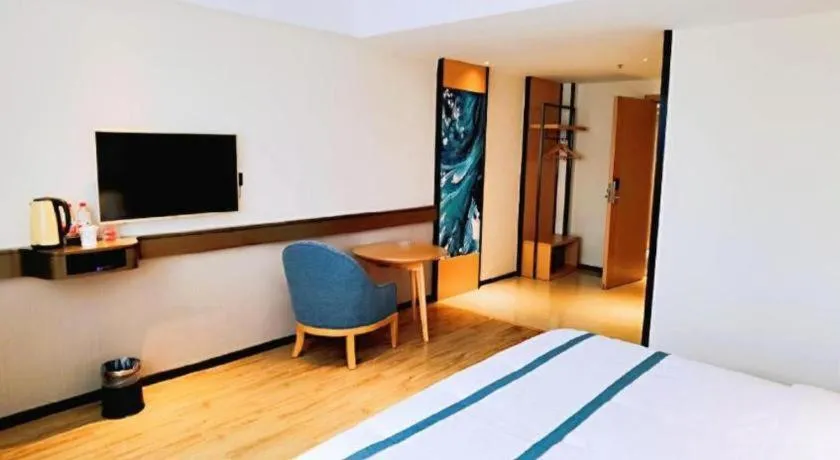 Bed in City Comfort Inn Hezhou Huangyao Ancient Town