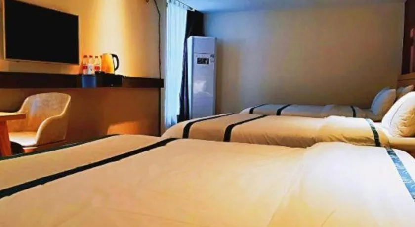 Bed in City Comfort Inn Hezhou Huangyao Ancient Town