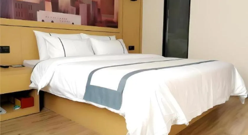 Bed in City Comfort Inn Hezhou Huangyao Ancient Town