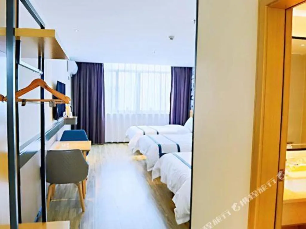 Bed in City Comfort Inn Hezhou Huangyao Ancient Town