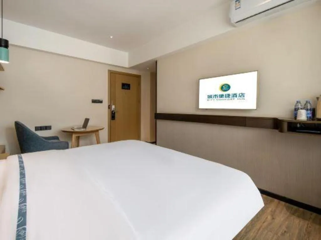 Bed in City Comfort Inn Hezhou Huangyao Ancient Town
