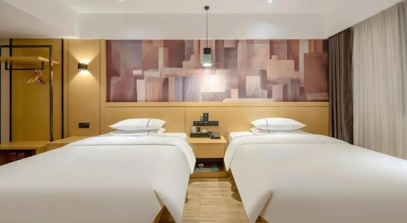 Bed in City Comfort Inn Hezhou Huangyao Ancient Town