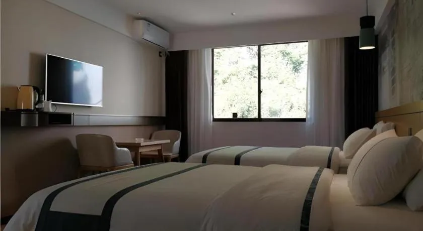 Bed in City Comfort Inn Hezhou Huangyao Ancient Town