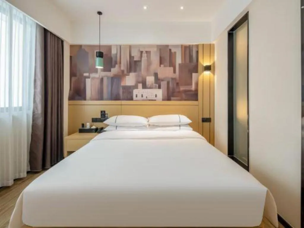 Bed in City Comfort Inn Hezhou Huangyao Ancient Town