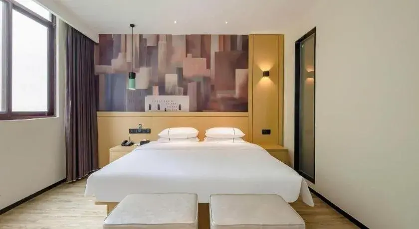 Bed in City Comfort Inn Hezhou Huangyao Ancient Town Bed in City Comfort Inn Hezhou Huangyao Ancient Town