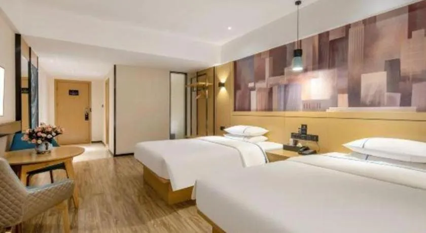 Bed in City Comfort Inn Hezhou Huangyao Ancient Town