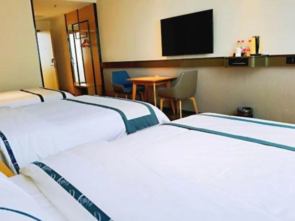 Bed in City Comfort Inn Hezhou Huangyao Ancient Town