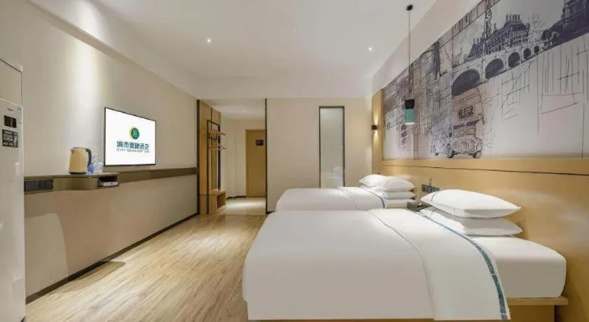 Bed in City Comfort Inn Hezhou Huangyao Ancient Town