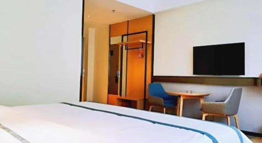 Bed in City Comfort Inn Hezhou Huangyao Ancient Town