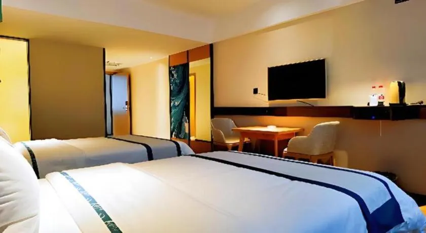 Bed in City Comfort Inn Hezhou Huangyao Ancient Town