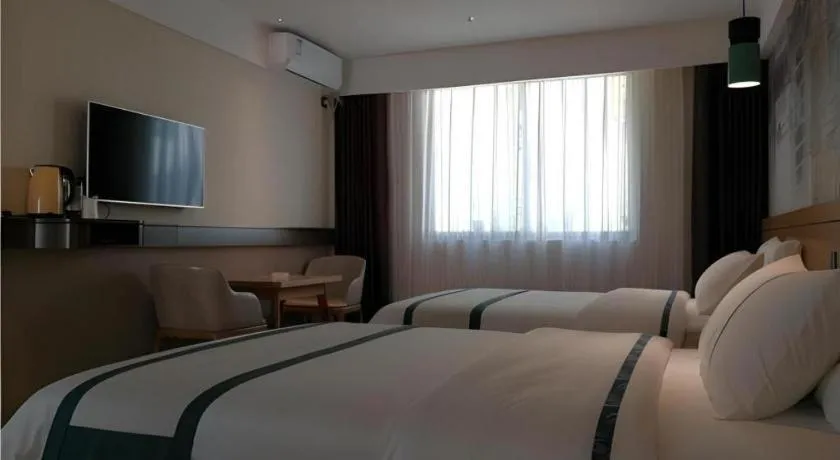 Bed in City Comfort Inn Hezhou Huangyao Ancient Town