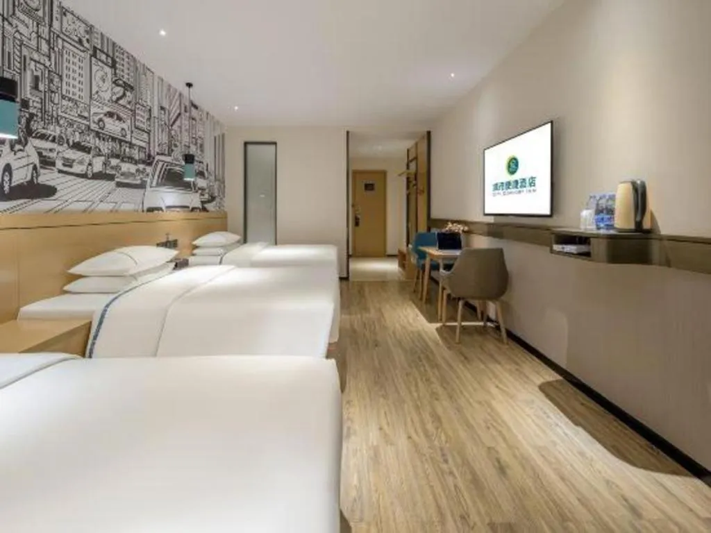 Bed in City Comfort Inn Hezhou Huangyao Ancient Town