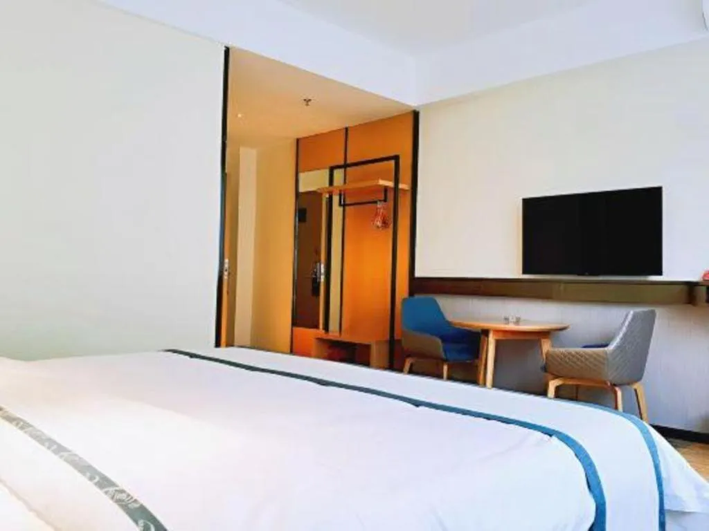 Bed in City Comfort Inn Hezhou Huangyao Ancient Town