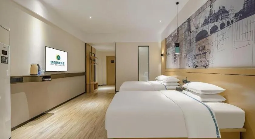 Bed in City Comfort Inn Hezhou Huangyao Ancient Town