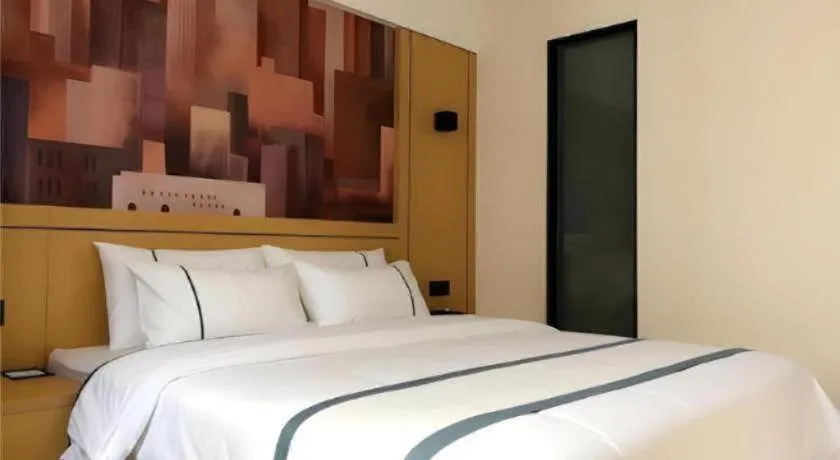 Bed in City Comfort Inn Hezhou Huangyao Ancient Town