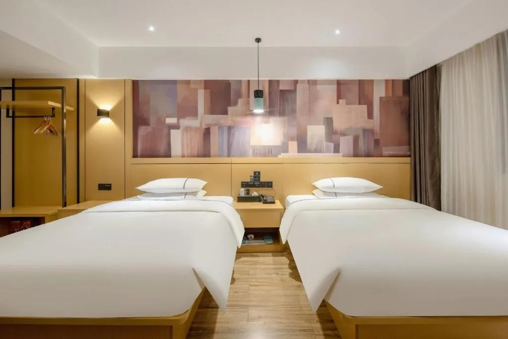 Bed in City Comfort Inn Hezhou Huangyao Ancient Town