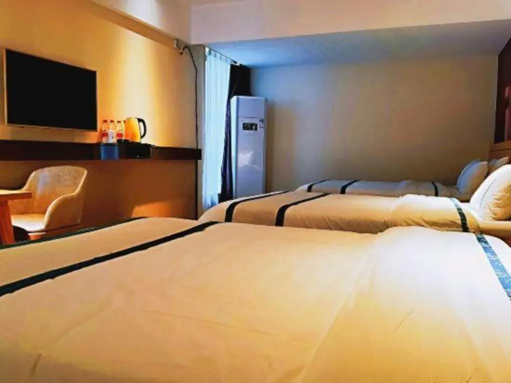 Bed in City Comfort Inn Hezhou Huangyao Ancient Town