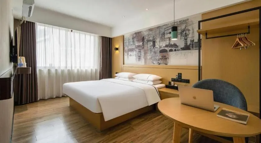 Bed in City Comfort Inn Hezhou Huangyao Ancient Town