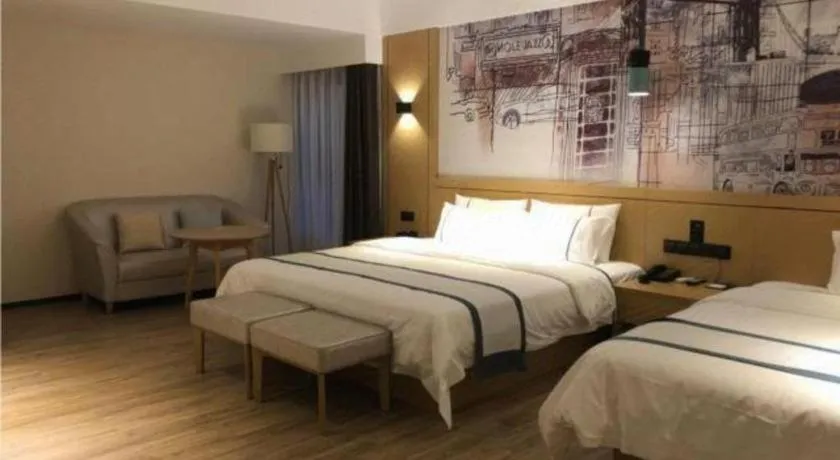 Bed in City Comfort Inn Hezhou Huangyao Ancient Town