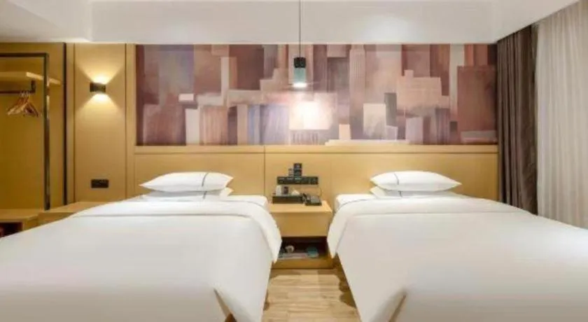 Bed in City Comfort Inn Hezhou Huangyao Ancient Town