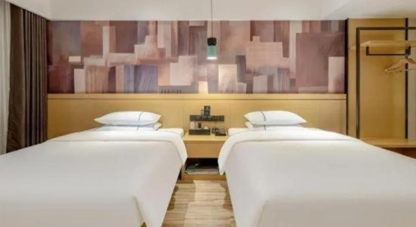 Bed in City Comfort Inn Hezhou Huangyao Ancient Town