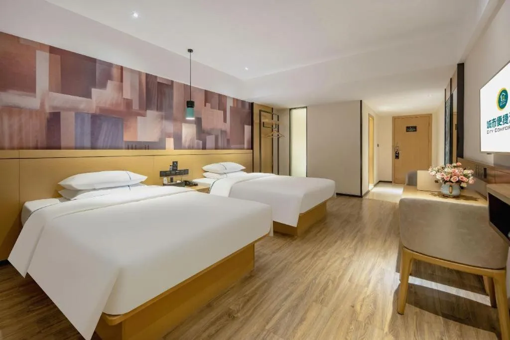 Bed in City Comfort Inn Hezhou Huangyao Ancient Town