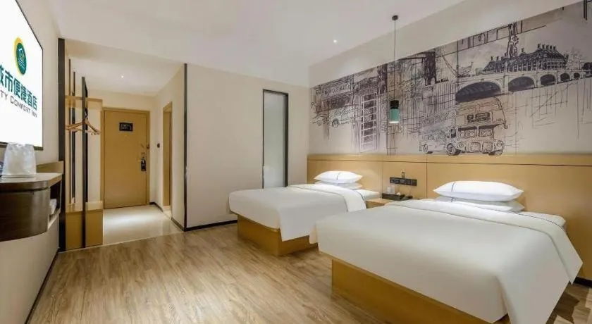 Bed in City Comfort Inn Hezhou Huangyao Ancient Town