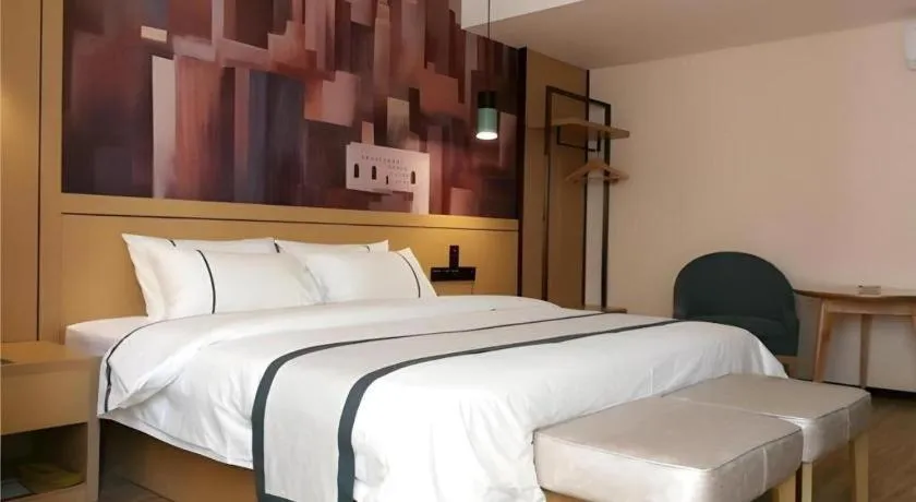 Bed in City Comfort Inn Hezhou Huangyao Ancient Town