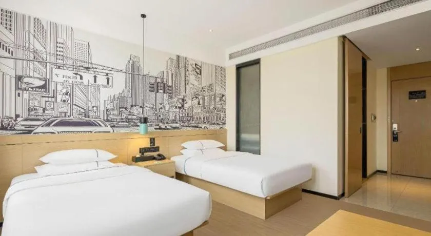 Bed in City Comfort Inn Jinzhou Bohai University Wanda Plaza