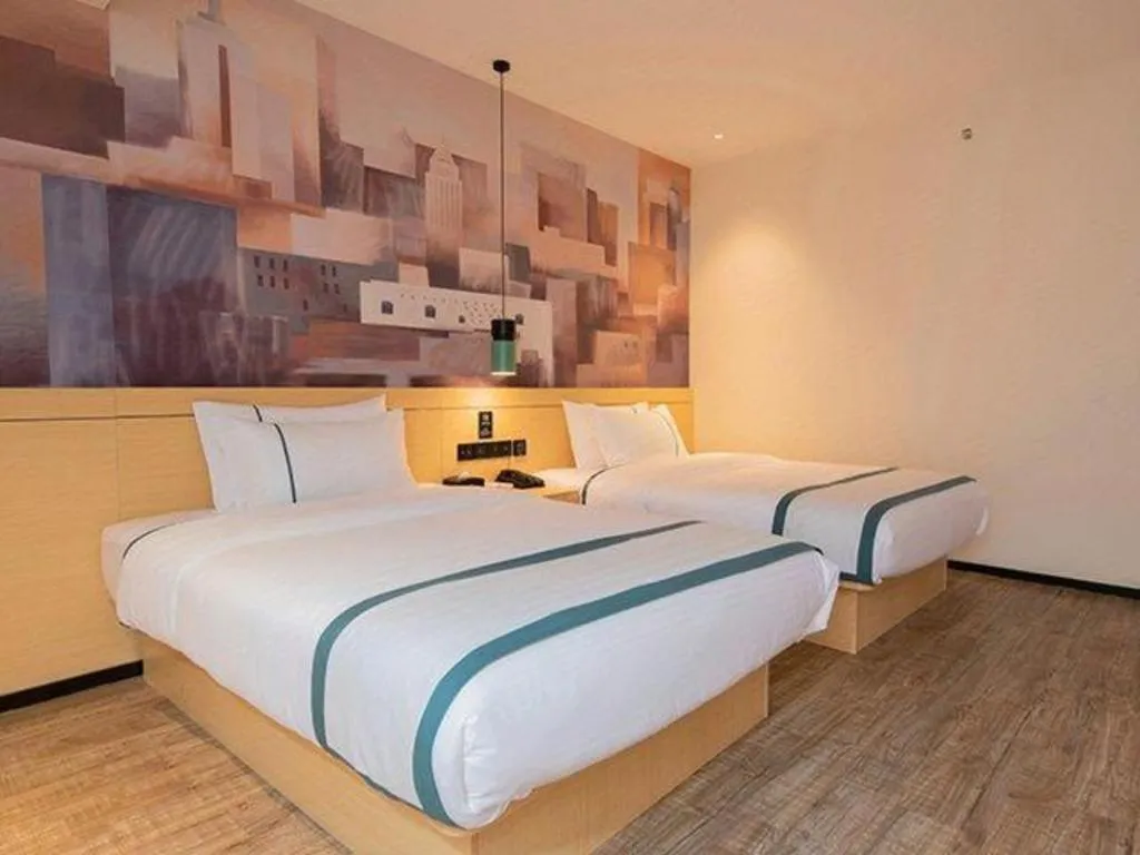 Bed in City Comfort Inn Jinzhou Bohai University Wanda Plaza